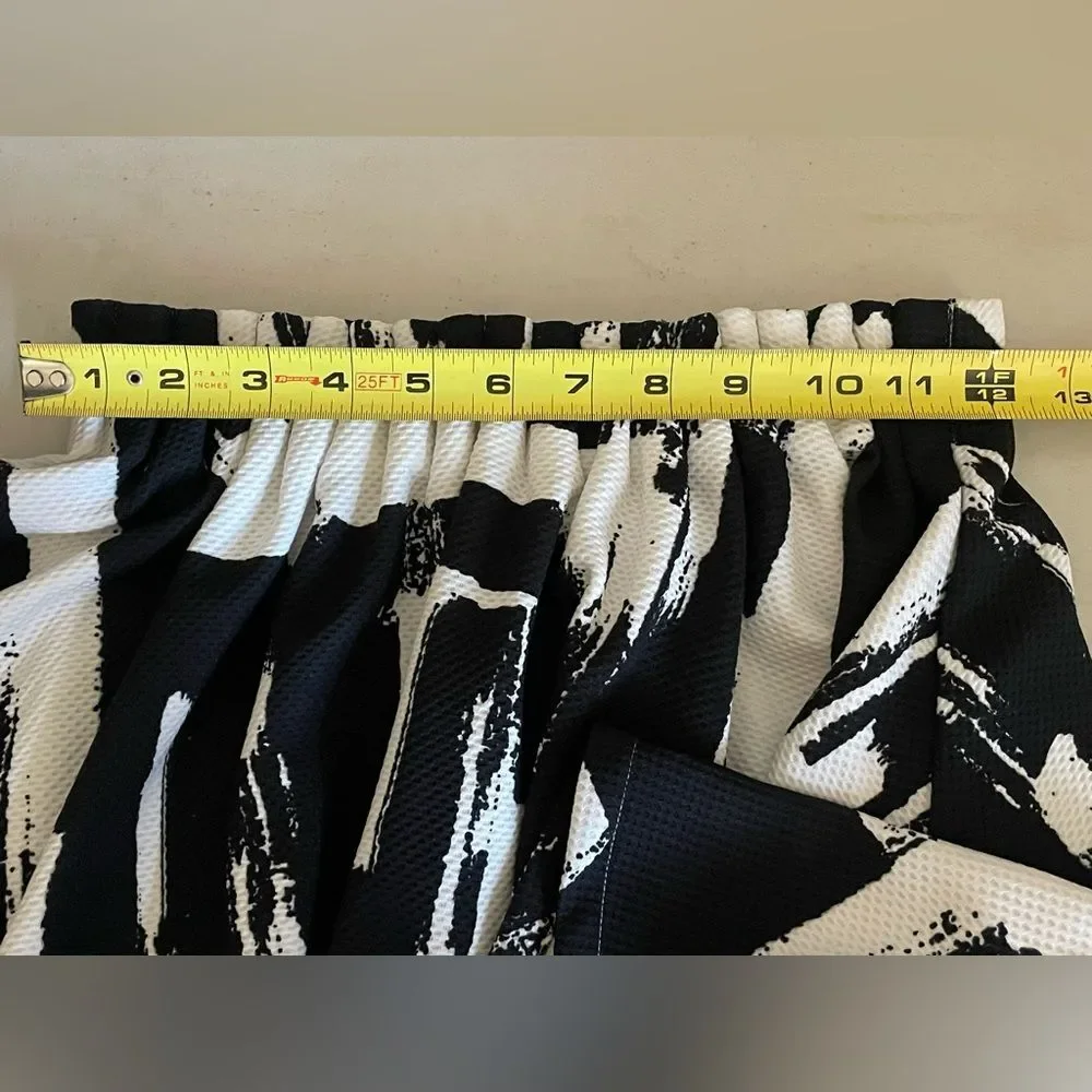 Lumiere | white and black patterned skirt stretchy medium polyester pleated